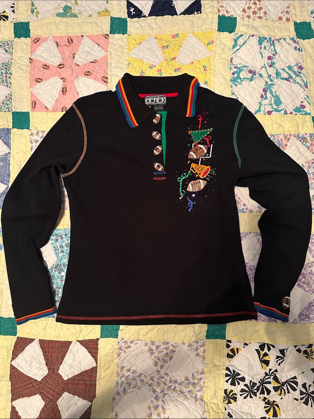 Berek Black Long Sleeve Polo with Rainbow Trim and Embroidered Motifs
